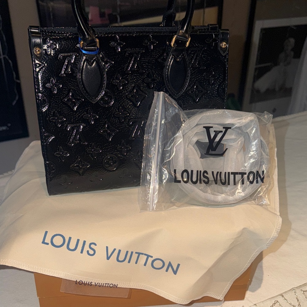 Luxury Shiny Black Mini Bag with cross body strap new with dustbag and box